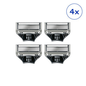 Four razor heads on a white background with a '4x' label.